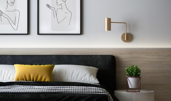 Relax and recharge in beautiful and spacious bedrooms a bed with yellow and white pillows